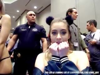 Lady is mickey mouse ear swallowing a dildo on comic con